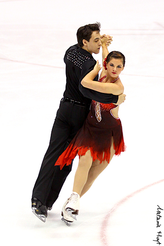 Picture of Jonathan (left) and Kelsey Barnes (right) ice dancing.